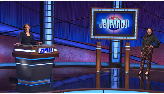 Grace Jeffrey, T '21 (right), on "Jeopardy!" with host Mayim Bialik.