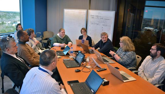 Members of the TechExpo planning committee meet to discuss this year's event. Photo by Jonathan Black.