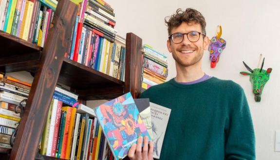 Joseph Hiller's collection of Latin American literature (top shelf) is quickly outgrowing his homemade bookcase.