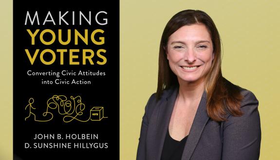 D. Sunshine Hillygus with the cover of the book "Making Young Voters: Converting Civic Attitudes into Civic Action."