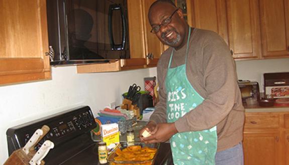 Kerry Haynie loves to cook and bake traditional family dishes like cream cheese pound cake and German chocolate cake, a few favorite desserts. Here, he’s making a sweet potato casserole. Courtesy of Kerry Haynie 