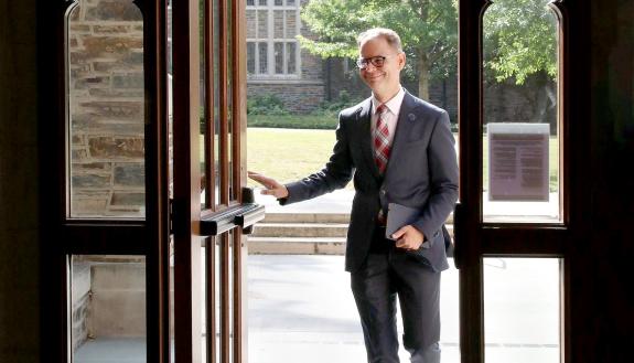 new university librarian Joseph Salem walks into the library