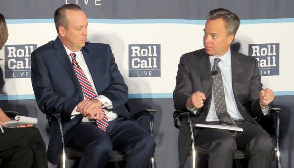 Mark McClellan, right, discusses what's next in health care policy Wednesday at a Roll Call forum. US Senate staff member Rodney Whitlock also participated on the panel. Photo by Jeff Harris