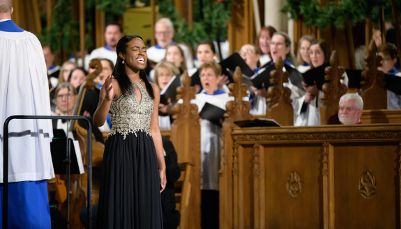 Duke undergraduate student Jordyn Blake sings a solo during the Chapel service.