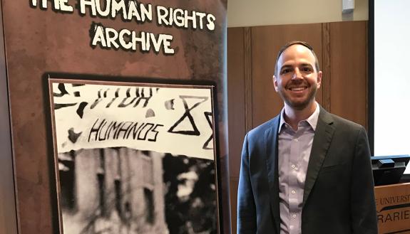 Matt Eisenbrandt discusses the continuing effect of the assassination of Archbishop Oscar Romero. Photo by Pablo Mino