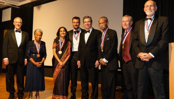 DNCR Secretary Reid Wilson, Eva Clayton, Priya Kishnani, Eric Church, Governor Roy Cooper, Mickey Michaux, Stanley Riggs, and David Zucchino.