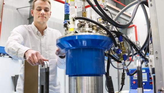 Tyson Lanigan-Atkins, a PhD student at Duke University, uses the cold (lower-energy) neutron triple-axis spectrometer at ORNL’s High Flux Isotope Reactor to study thermoelectric materials. Image Credit: ORNL/Genevieve Martin