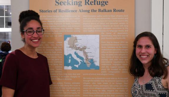Olivia Johnson, left, and Lily Doron, right, at the gallery opening of their “Seeking Refuge” capstone exhibit, on display in the Keohane-Kenan Gallery.