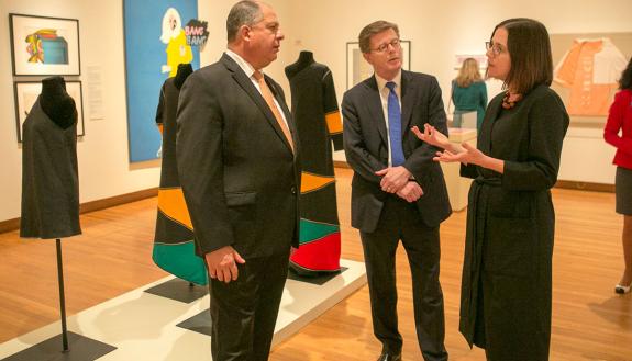Costa Rican President Solis visits the Pop American exhibit at the Nasher. With him is Duke President Vincent Price and exhibit curator Esther Gabara.