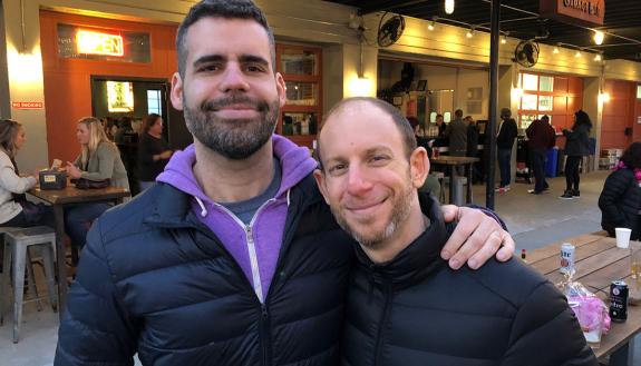 Gabriel Rosenberg (left), a professor of gender, sexuality and feminist studies and history, has been named the new Faculty in Residence (FIR) in Southgate residence hall on East Campus. He is pictured here with his partner  Harris Solomon, an associate p