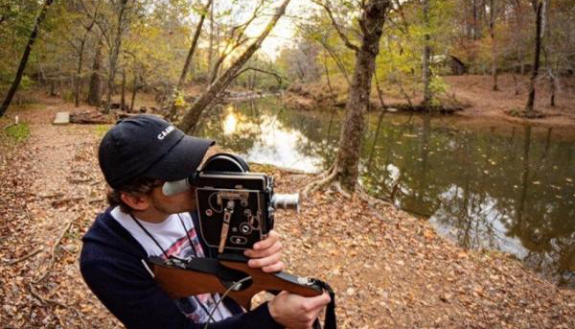 Quinten Sansoti with camera Senior Quinten Sansoti shoots with 16mm film. (Photo by Chris Teufel.)