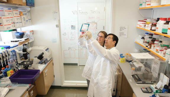 researchers in a lab