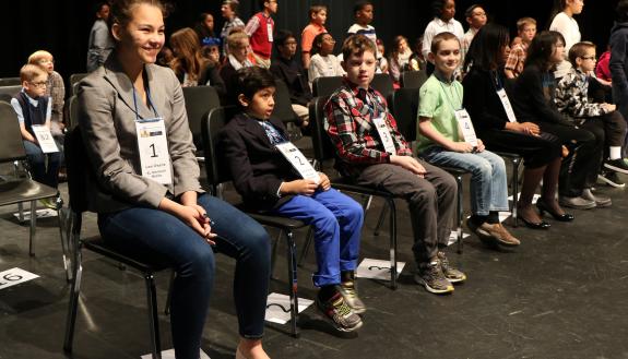 Students line up for their turn to spell at the 2017 Duke University Regional Spelling Bee.