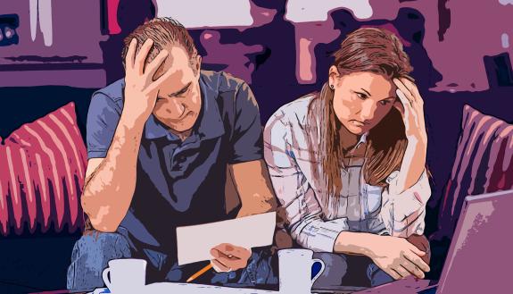 stock art graphic of a couple worrying about money