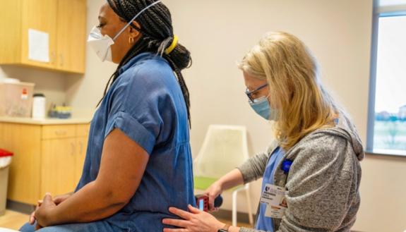 patient getting treated for lower back pain