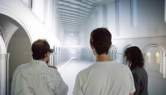 People stand in front of a digital reconstruction of a choir screen at Santa Chiara, a church in Naples. The Wired! Lab hosted two master’s students from the University of Padua who worked on the project. Photo courtesy of the Duke Wired! Lab.