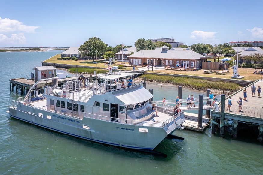 The research vessel moored at the dock at the Duke University Marine Lab