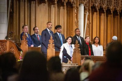 Grant Hill with other speakers at the ceremony Sunday.